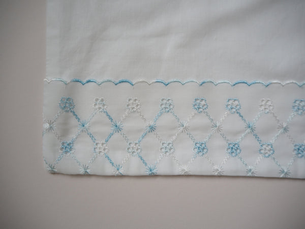 Pillowcase with blue embroidery